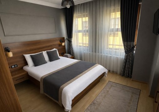 Tek Kişilik Double Yataklı Oda